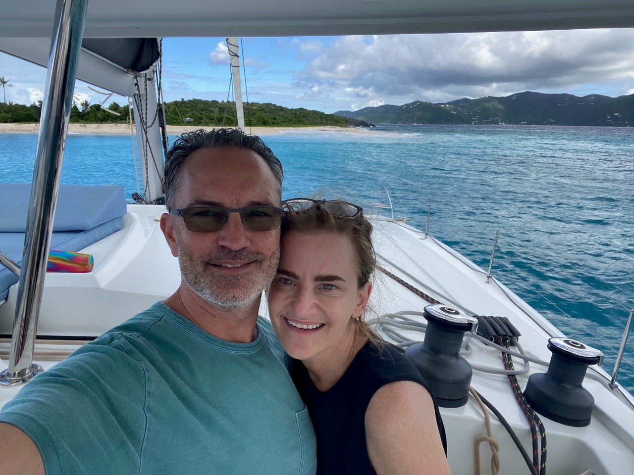 Smile Maker Charters clients Pete and Laura on a yacht